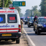 Ambulance Beside Official Convoy
